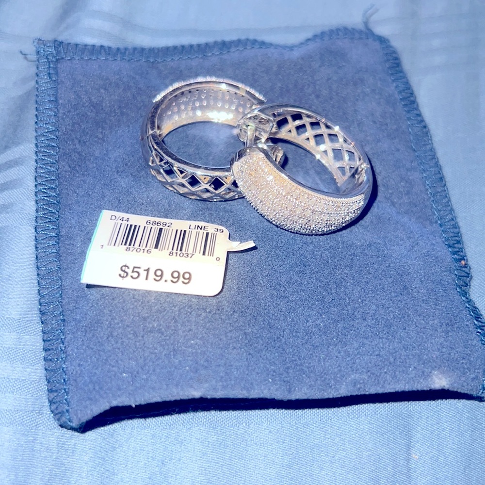 Diamond swirl baguette earrings with omega back